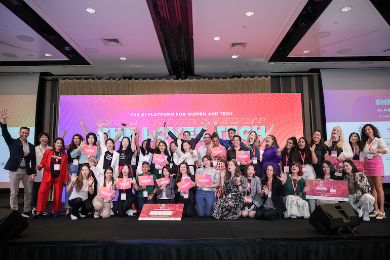 The She Loves Tech 2023 cohort on stage