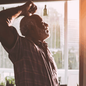 A man stretching. Gentle Exercises for Seniors With Joint Pain or Arthritis